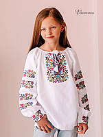 Блуза вишита дитяча,квітковий орнамет на домотканому полотні.
