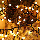 Гірлянда велика матова кулька 200 LED Теплий білий Чорний провід, фото 2