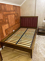 Современная кровать в ткани с мягким изголовьем