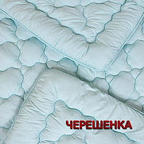 Зимова тепла Євро ковдра 195х210 см стьобана мікрофібра / холлофайбер однотонна блакитного кольору, фото 3