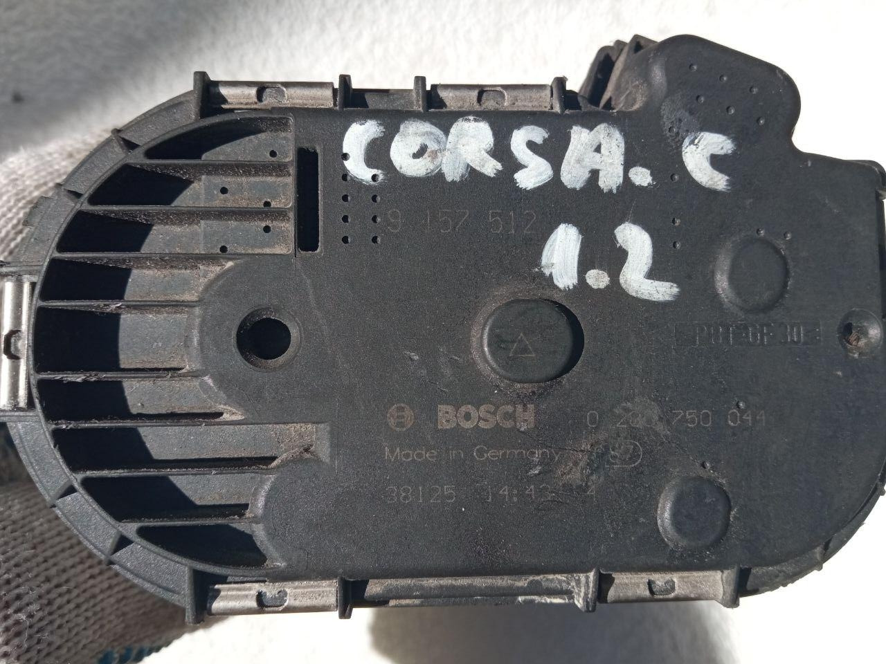 Дросельна заслінка Opel Corsa C 1.2 Bosch 0 280 750 044 / 9157 512