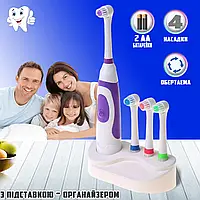 Електрична зубна щітка ToothBrush-07 на батарейках, 4 насадки, з підставкою Фіолетовий JMP