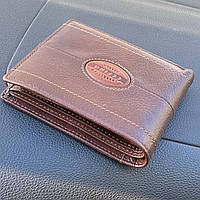 Чоловічий гаманець коричневого кольору шкіряний