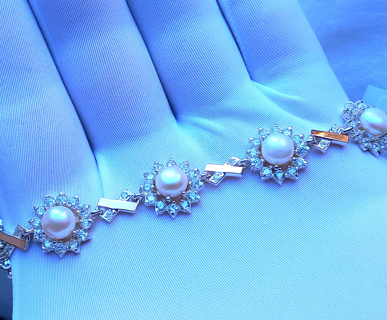 Срібний браслет із золотими вставками  перли