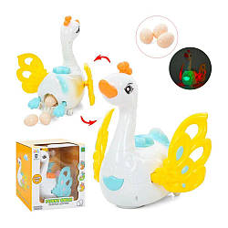 0630 Лебідь 20 см, їздить, несе яйця (3 шт.), музика, світло, рухомі деталі, в коробці