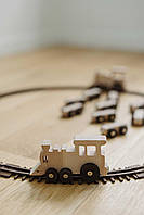 Экоигрушка поезд с вагонами из дерева с буквами и животными