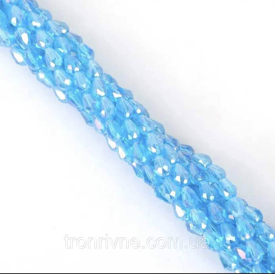 Намистини ребристі скляні напівпрозорі Крапля 5х7 мм, голубий (за уп.10 шт)