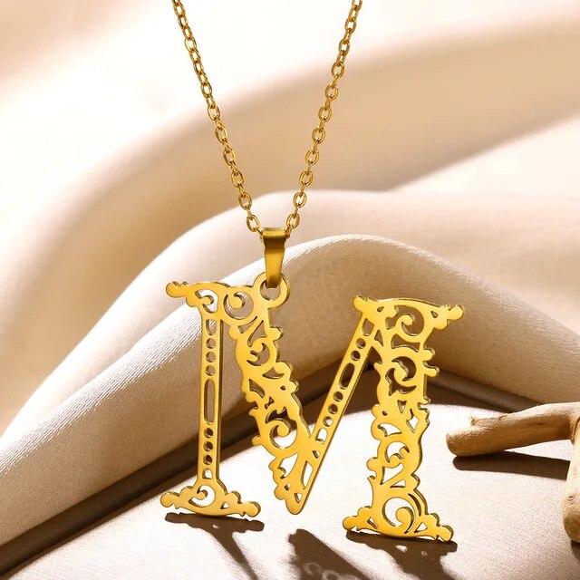 Ланцюжок з кулоном нержавіюча сталь мед золото Liresmina Jewelry буква М виноградна лоза 3 см золотистий, фото 1