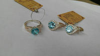 Серебряный набор - серебряные серьги и кольцо с синим камнем в обрамлении сверкающих фианитов