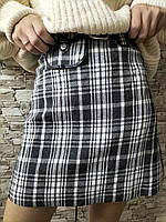 Женская юбка серая в клеточку мини трикотаж