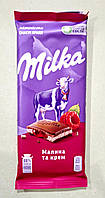 Шоколад Milka с малиной и кремом молочный 90 г