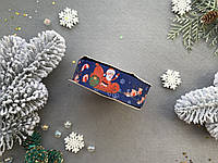 Лента репсовая с рисунком новогодняя тематика 2,5 см "Дед Мороз с оленями на синем"