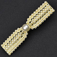 Шпилька затискач для волосся металева золотистого кольору бантик із перлинками розмір 6,5х1,5 см