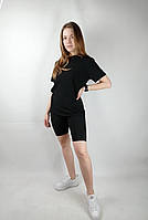 Женский модный костюм футболка с легінсами черного цвета