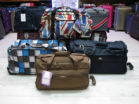 Дорожні сумки