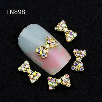 Декоративний елемент. Розмір 5х8мм.Цина за 1 шт.