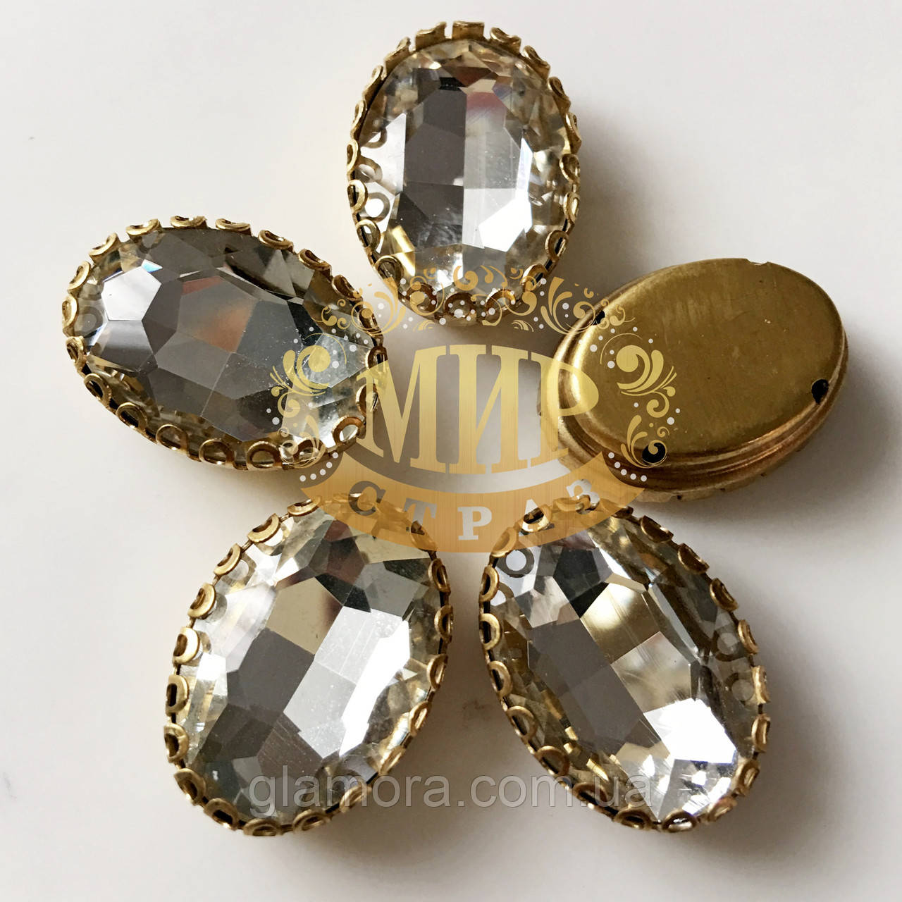 Овал в ажурній золотій оправі Колір Crystal Розмір 13х18мм