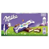 Шоколад молочний Milka Milkinis з молочною начинкою 87.5 г
