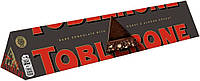 Чёрный шоколад Toblerone с медово-миндальной нугой 100 г Швейцария