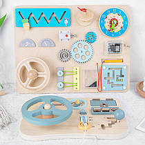 Дерев'яний бізіборд для малюків з 11 іграми: кермо, лабіринт, годинник, музична скринька (C 61700)
