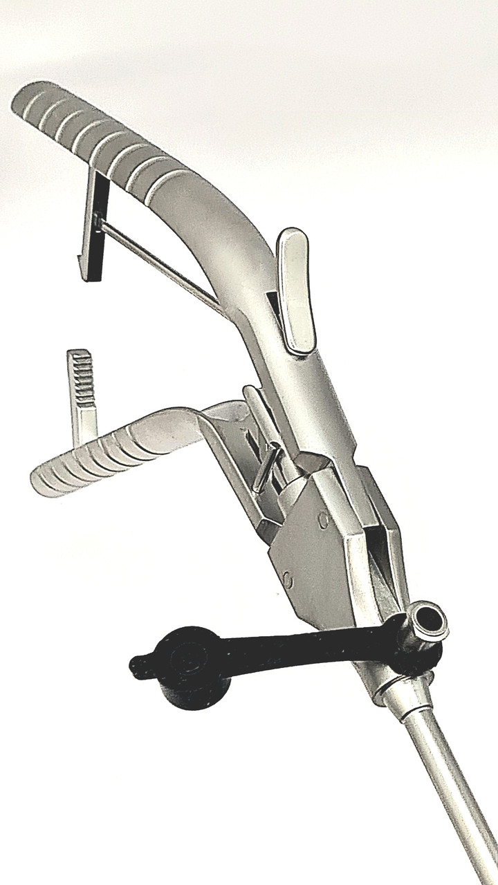 Лапароскопический иглодержатель с титановой пистолетообразной рукояткой ...