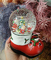 Заводна новорічна снігова куля в черевику 17 см