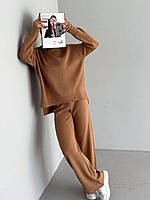 Стильний трикотажний жіночий коричневий костюм на осінь в універсальному розмірі теплий модний жіночий одяг
