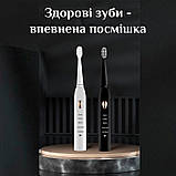 Електрична ультразвукова зубна щітка 4 змінні насадки на акумуляторі X.Q.M.Q B-1 чорна (GS-115143), фото 8