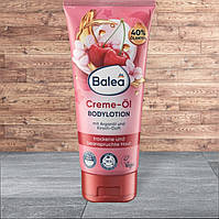 Balea Creme-Ol Bodylotion, живильний лосьйон для тіла з аргановою олією та ароматом вишні, 200 мл