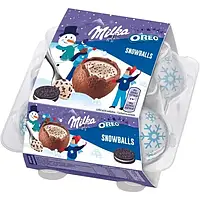 Фигурный молочный шоколад Milka Snow Balls с кремовой молочной начинкой и кусочками печенья Oreо, 112 г