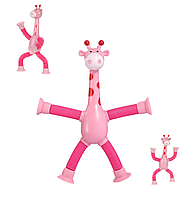 Дитяча розвивальна підсвічувальна іграшка для малюків жираф на присосці (рожева)