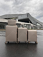 Валіза пластикова Wings WN01 велика (L) на 4-х подвійних колесах Шампань