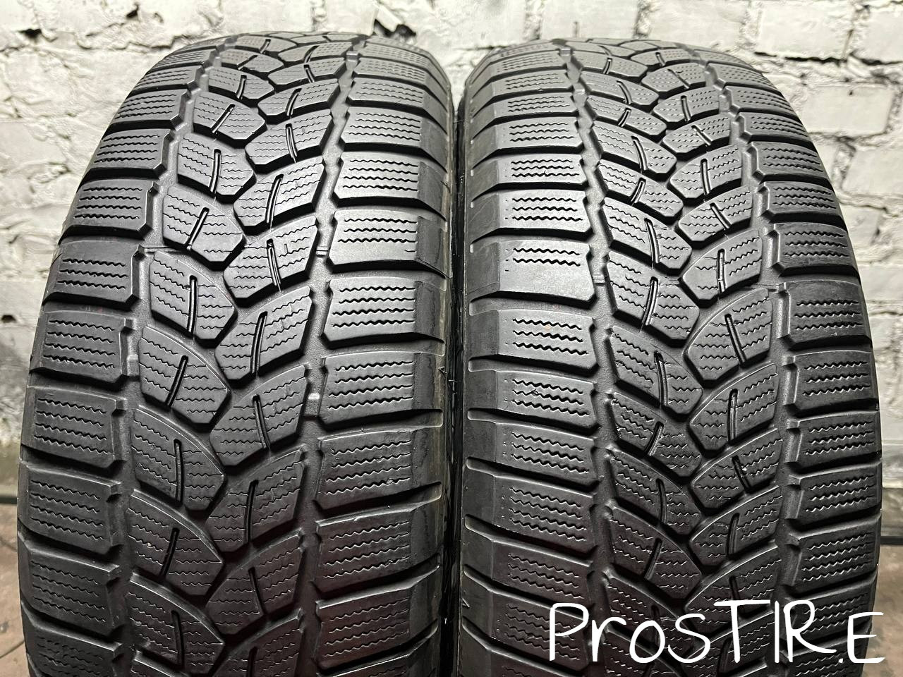 Зимові шини б/у 215/60 R16 Firestone WinterHawk 3