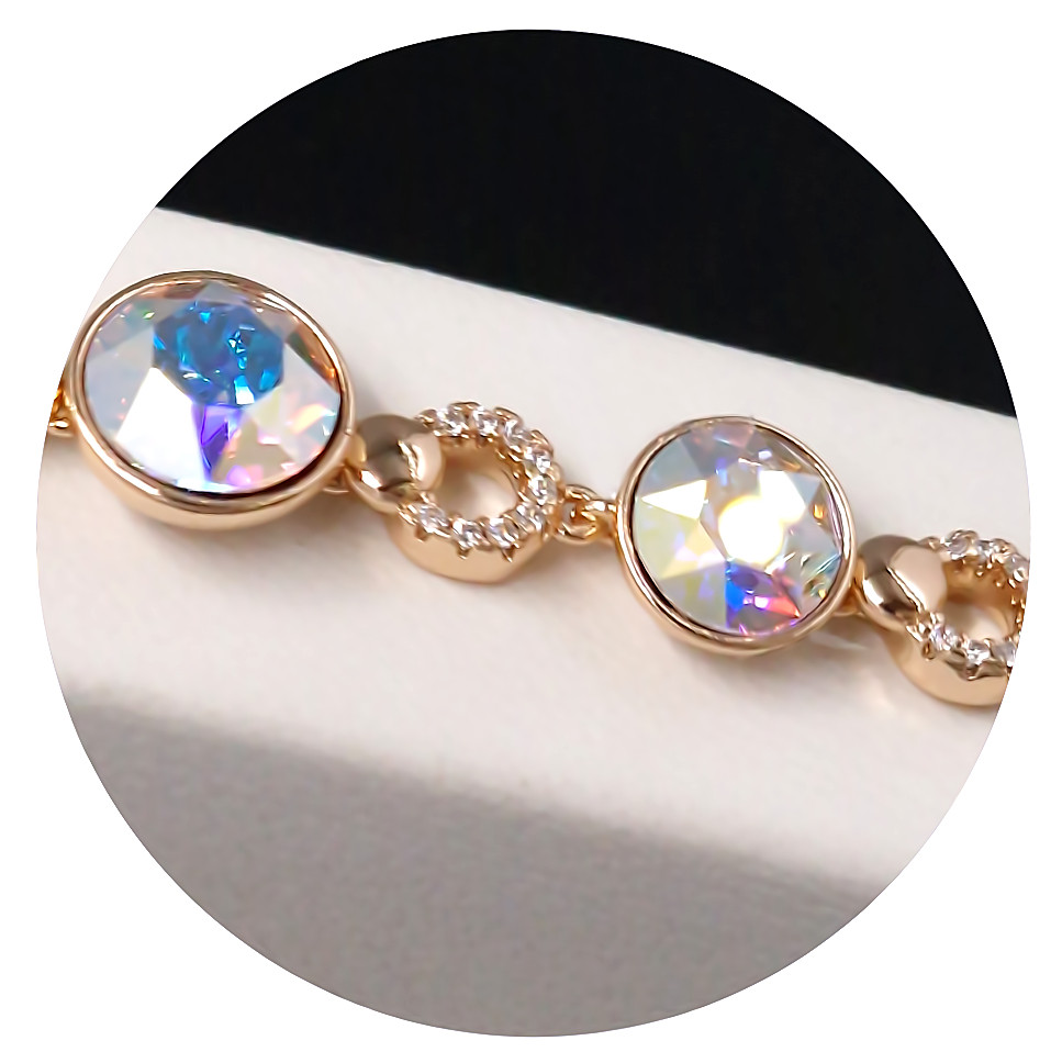 Браслет XР. Позолота 18К. Камені: Swarovski бензинового кольору. Довжина: 17.5-20 см.