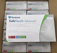 Перчатки нитриловые текстурированные без пудры нестерильные SafeTouch® Advanced зеленые, размер S