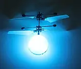 Іграшка літаюча куля зі світлом Flying Ball блакитний, Кулька-вертоліт, що літає від руки, Інтерактивна іграшка, фото 4
