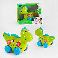 Динозаврик 6105 (18) "Huile Toys", їздить, говорить англійською мовою, програє мелодії і звуки, з