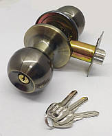 Ручка дверна кругла Джанес, Ручка-стяжка з ключем 607, колір бронза AB, FZB дешева