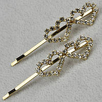 Невидимки для волосся металеві золотистого кольору із сердечками з білими кристалами 2 штуки довжина 6 см