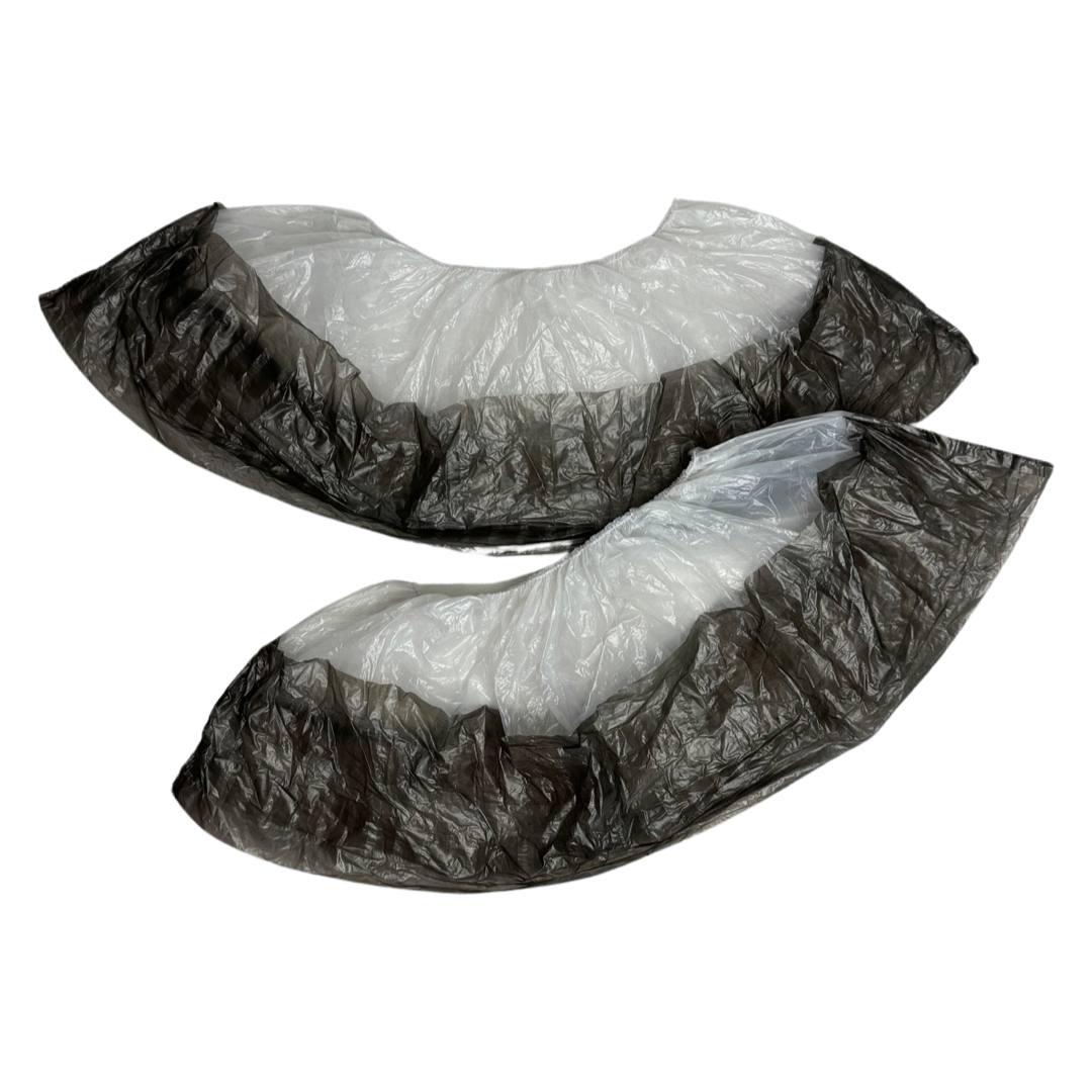 Бахили поліетиленові з подвійним дном посилені, вага 5 грам (пара) 25 мкм, 40*14 см 100 шт (50 пар) біло-чорні, фото 1