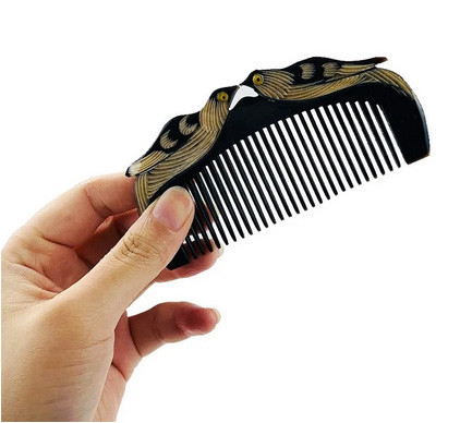 Гребінець Качечки мандаринки з кістки для волосся натуральний, фото 1