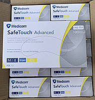 Перчатки нитриловые текстурированные без пудры нестерильные SafeTouch® Advanced желтые, размер M