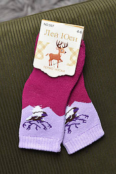 Шкарпетки дитячі махрові для дівчинки фіолетового кольору 167873M