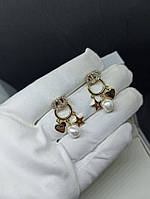 Серьги Dior лого с камешками в золоте с жемчугом.