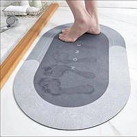Овальний вологопоглинальний килимок для ванни та кухні 40х60 см