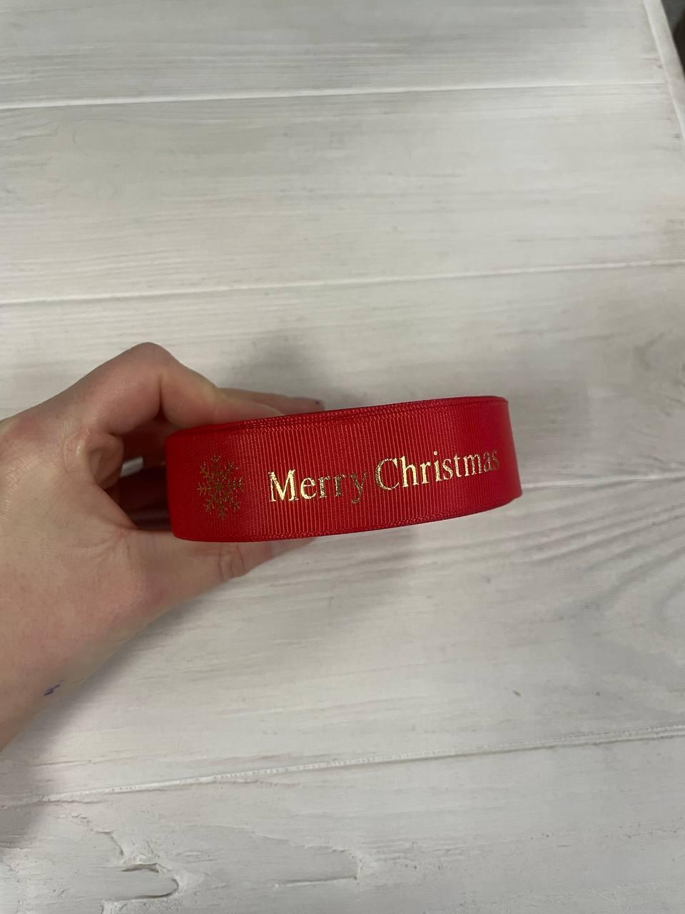 Репс " Merry Christmas зі сніжинками № 2 " 2,5 см червоний рулон 22.5 метри