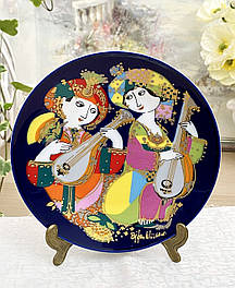 Порцелянові настінні тарілки, блюдця, розетки