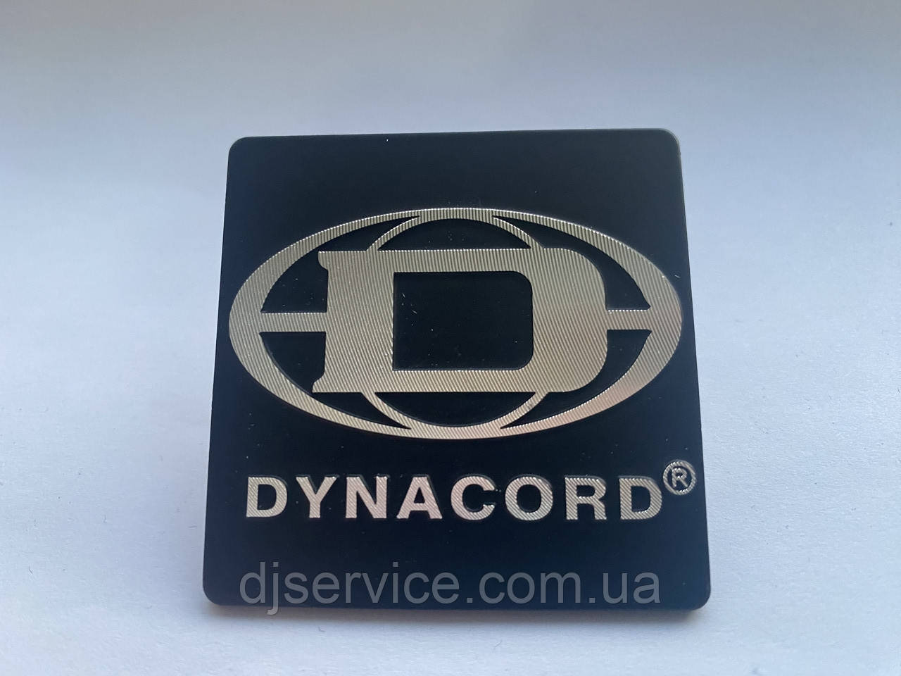 Шильдик, наклейка, логотип (metall) 50x50mm  1 шт. на сітку колонки Dynacord, фото 1