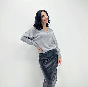 Діловий костюм жіночий з кофточки та спідниці