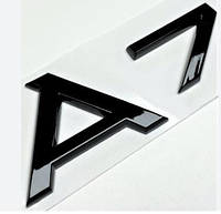 Шильдик эмблема надпись на багажник AUDI A7 цвет черный